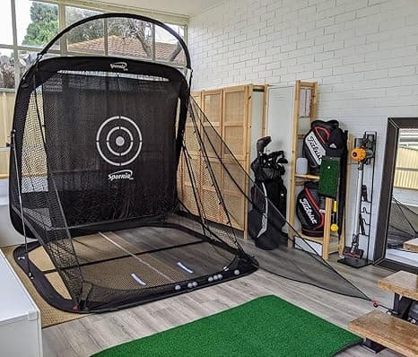 Spornia SPG-7 pop-up golf net set up in a garage